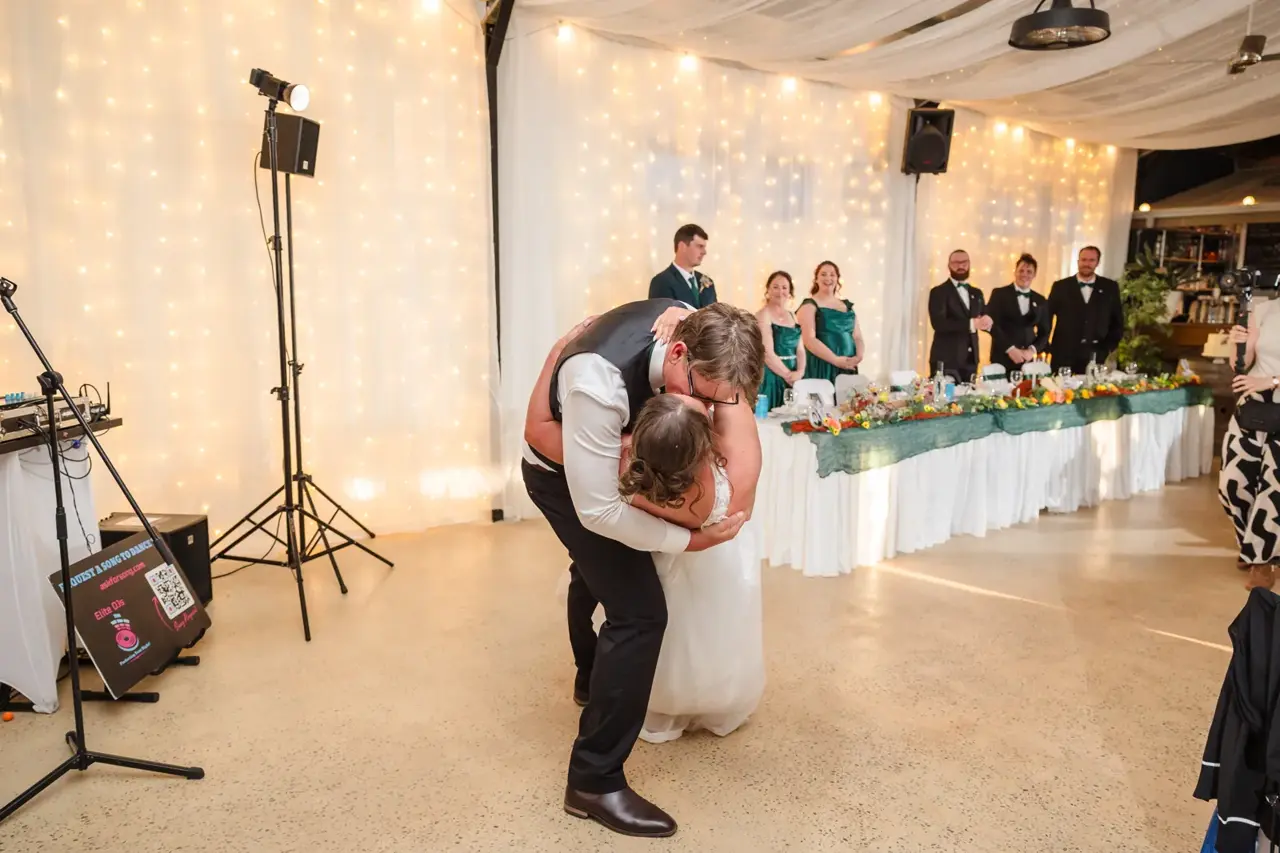 Jason dips Courtney during their choreographed first dance