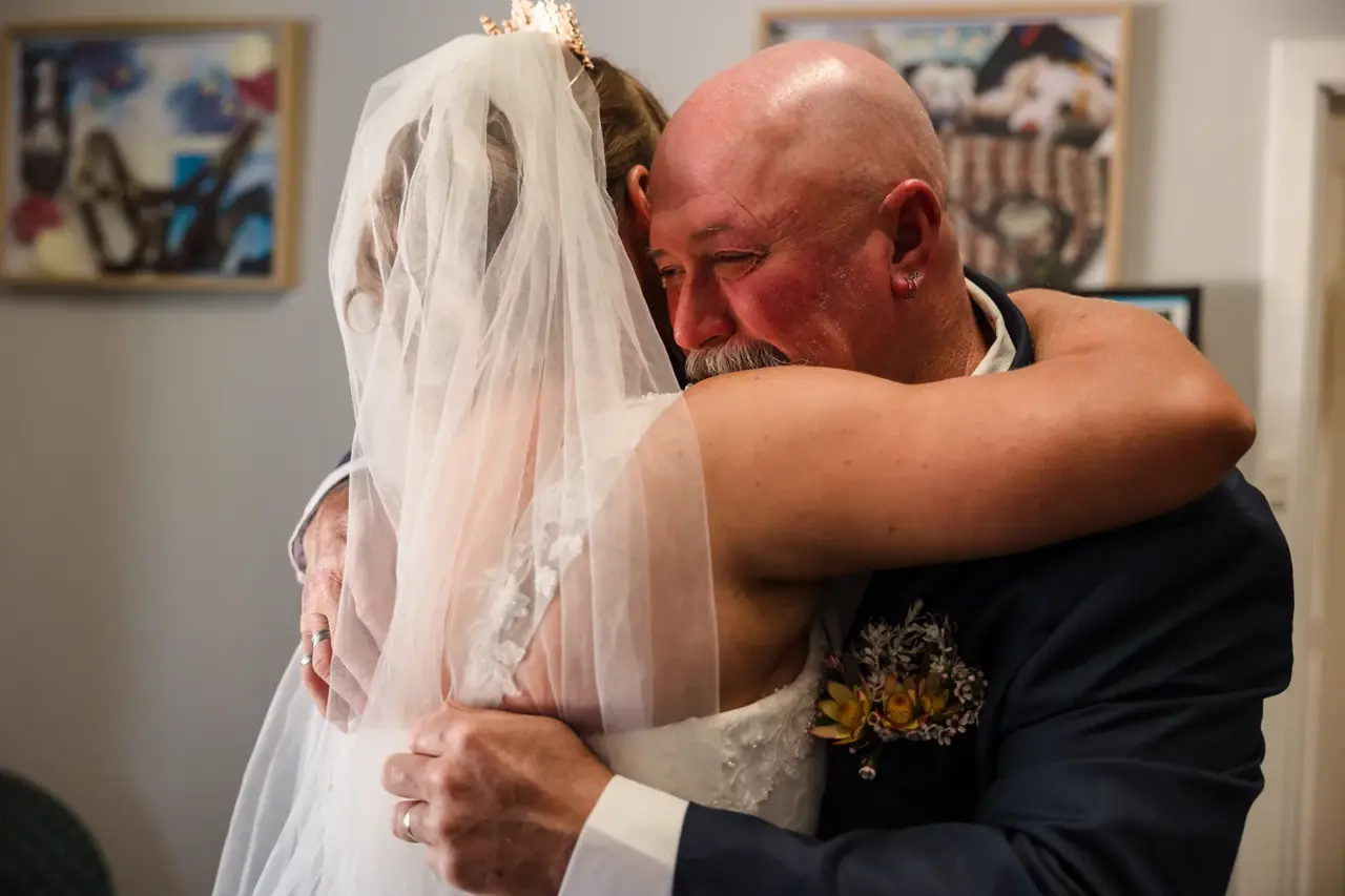 Courtney hugs her dad after their first look