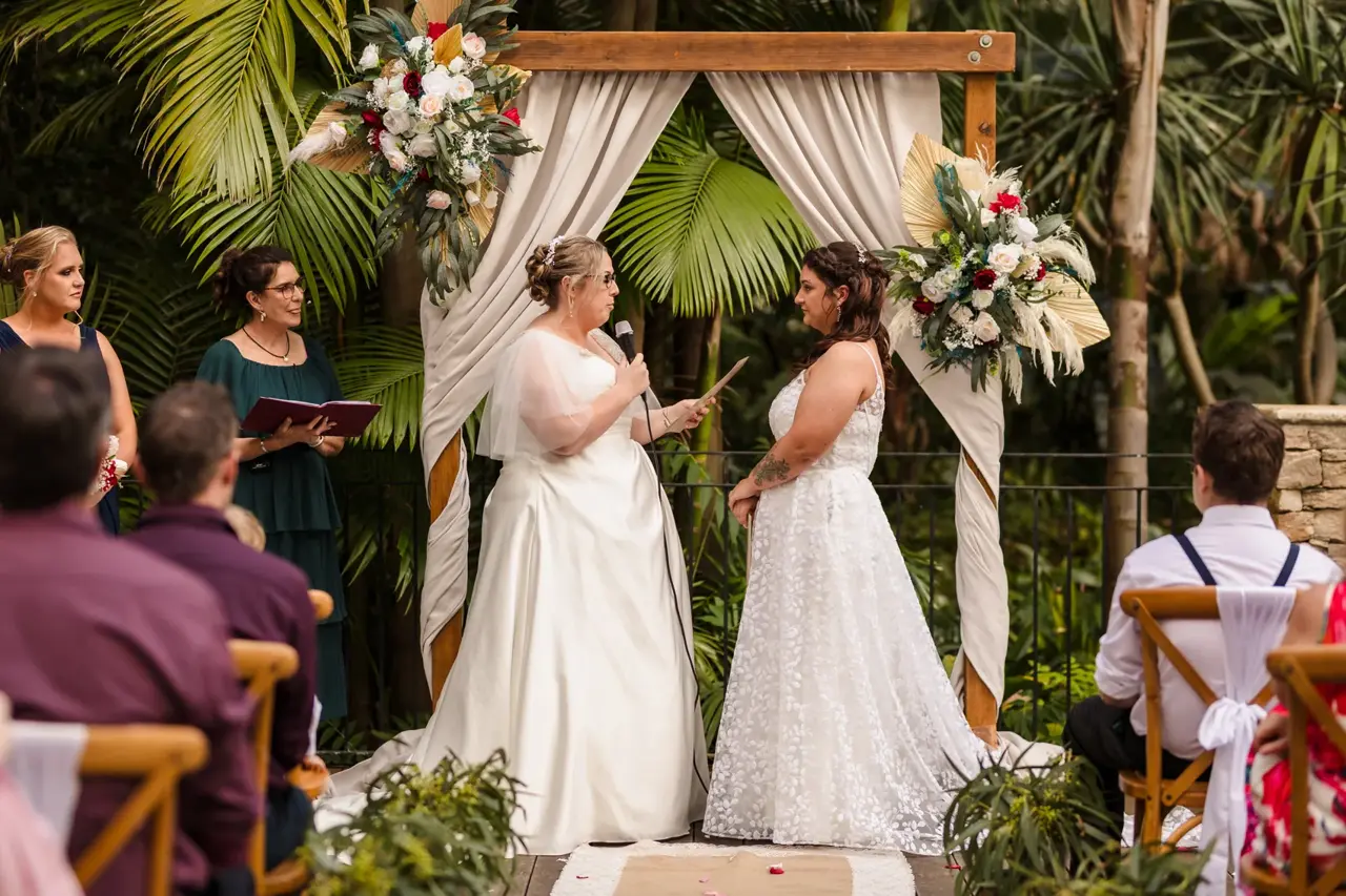 Kat and Jess at the floral ceremony arbour on the deck at Wanneroo Botanic Gardens