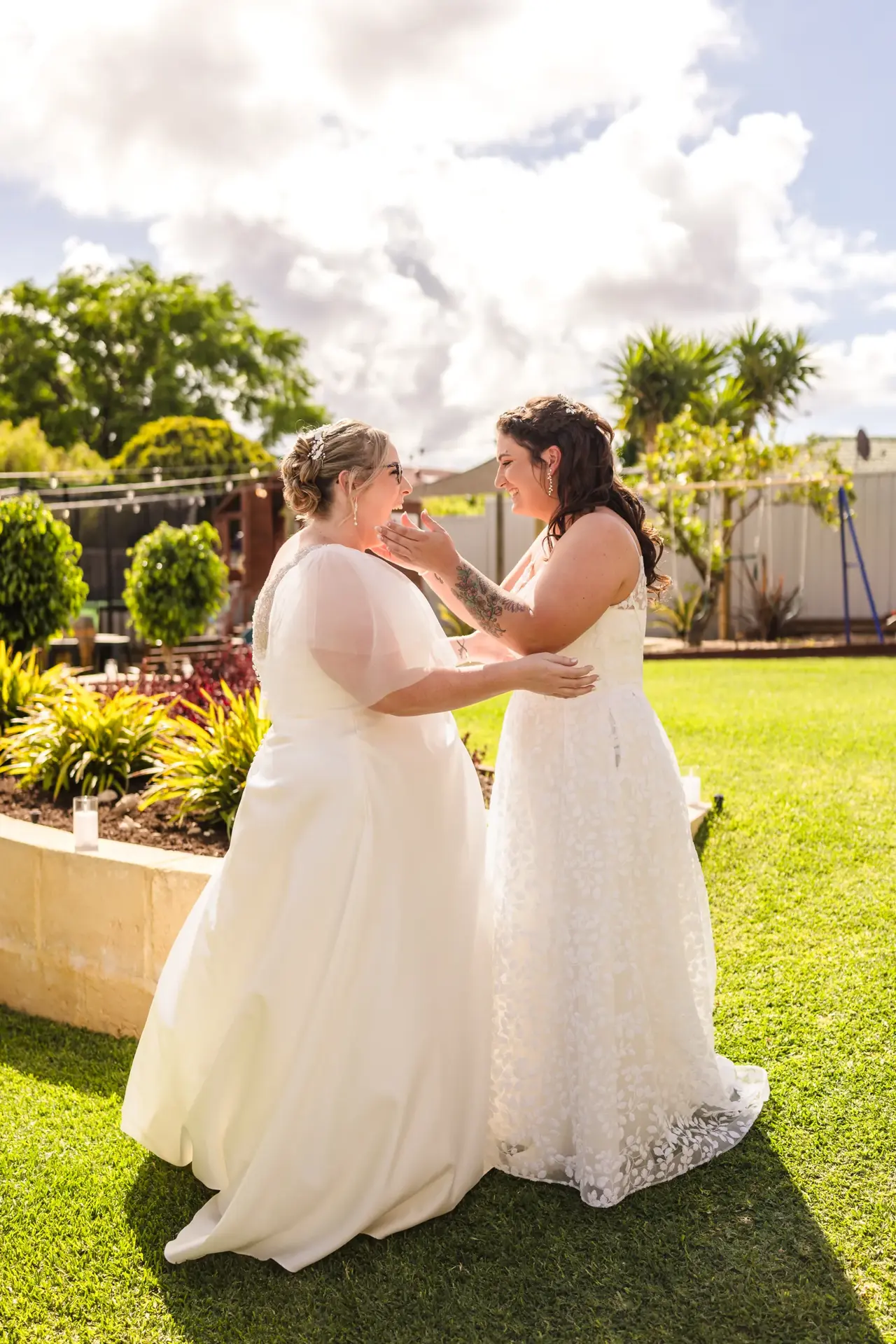 Kat and Jess embracing at their first look before the ceremony