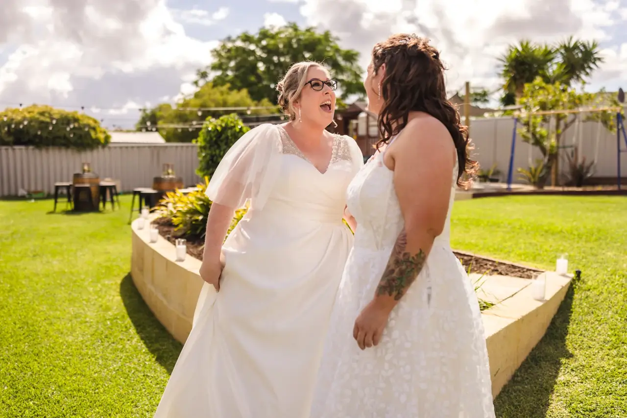 Kat and Jess face to face during their backyard first look