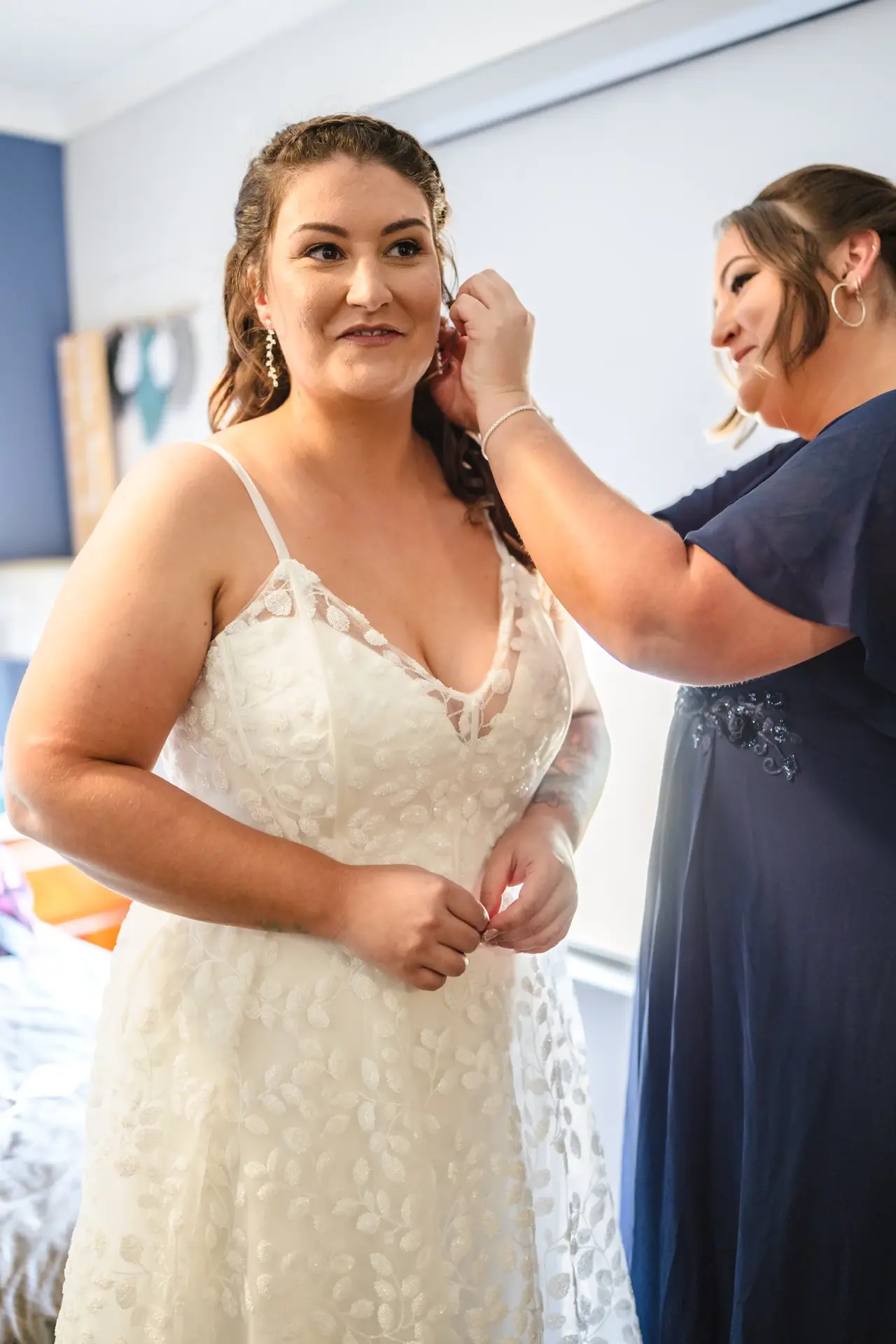 Final touches into the wedding dress before the ceremony