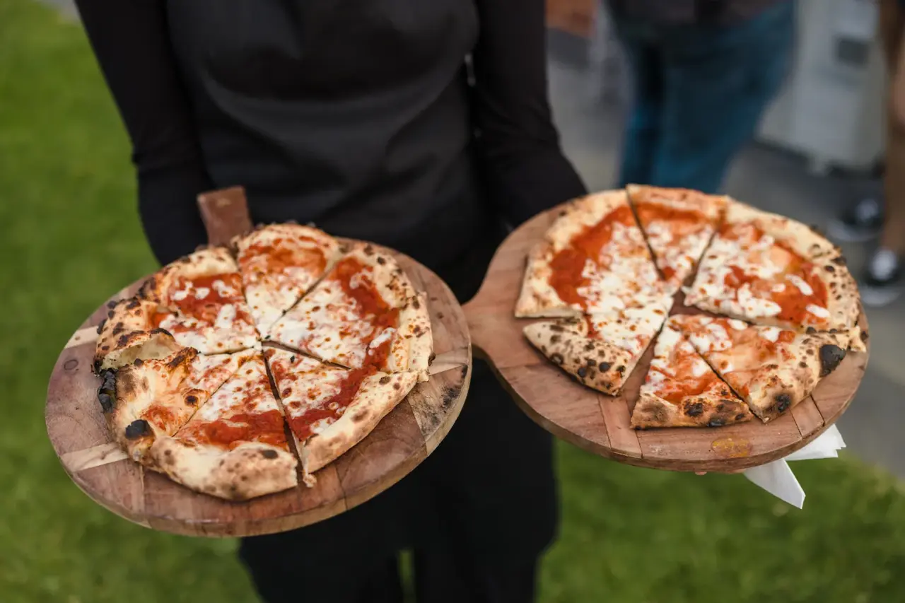 Wood-fired pizza at Kat and Jess's backyard reception