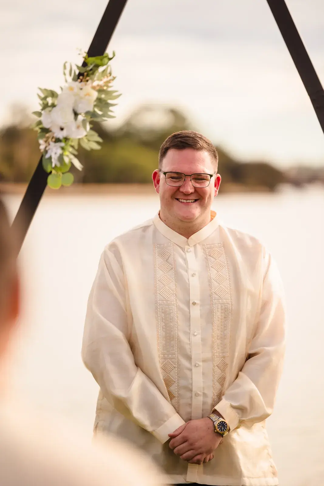 Mitch waiting at the ceremony arbour in a cream barong at Burswood on Swan