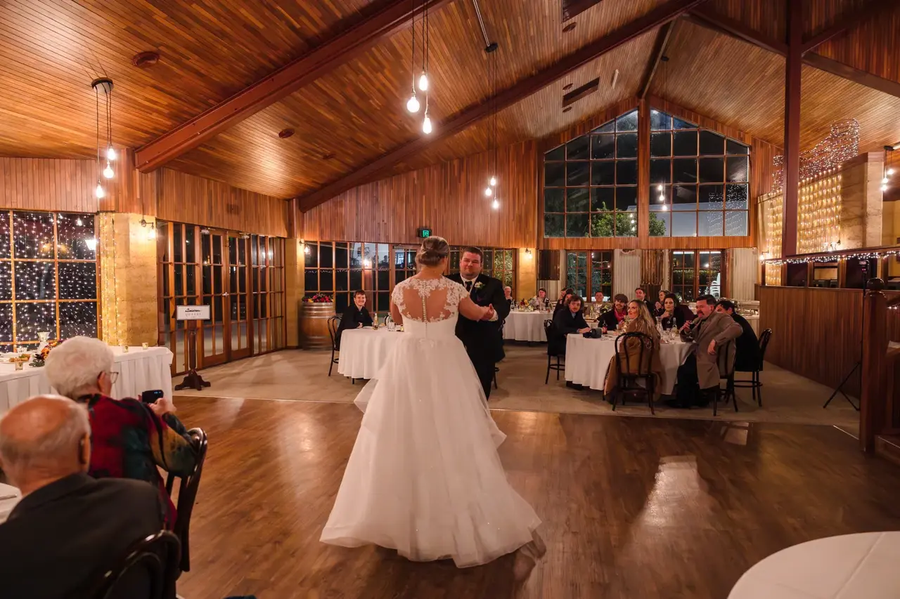 Sarah and James share their first dance in the Homestead at Quarry Farm