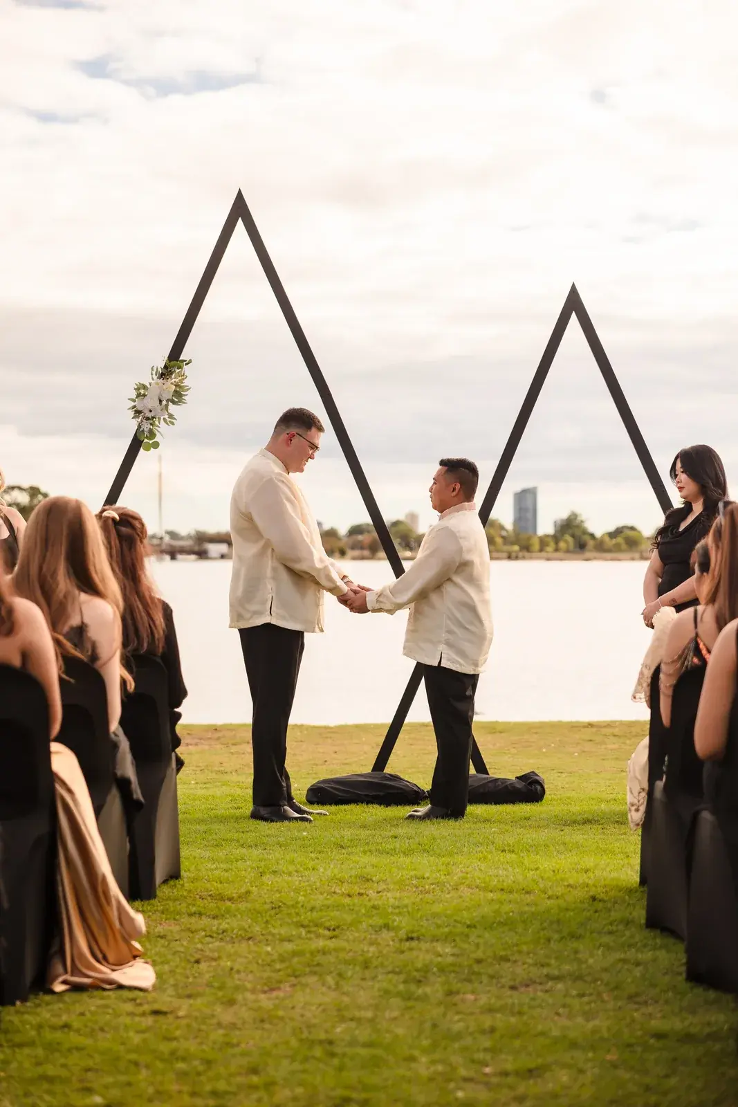 Two grooms at the ceremony arbour by the Swan River at Burswood on Swan