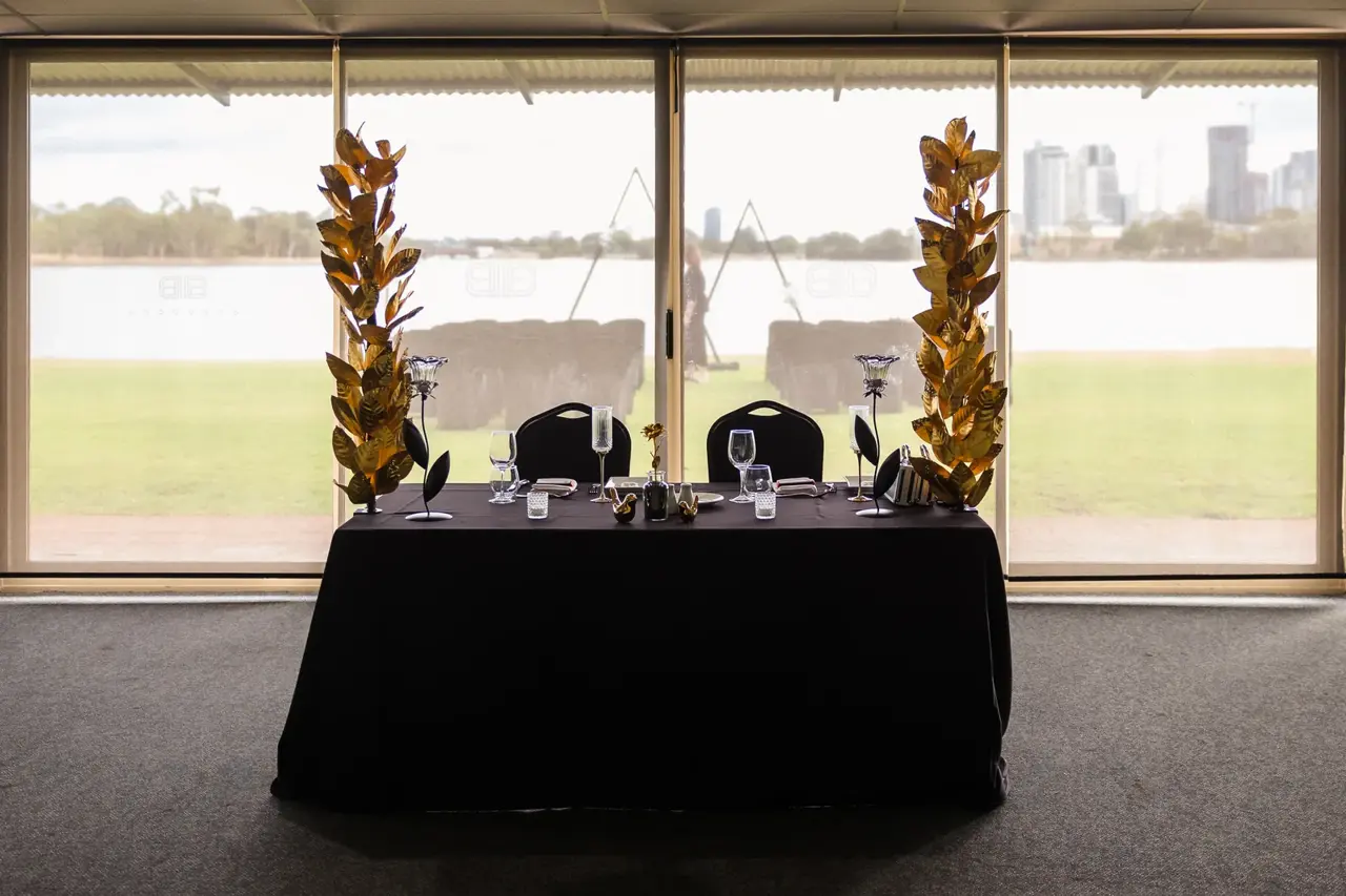 The Perth city skyline across the Swan River seen through the reception windows at Burswood on Swan