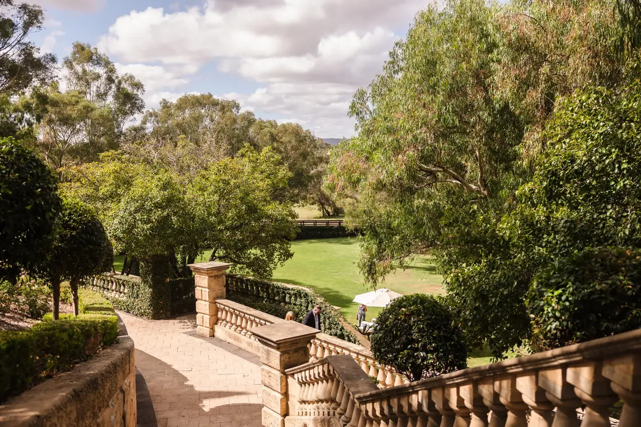 A sandstone balustrade stepping down through the gardens at Caversham House