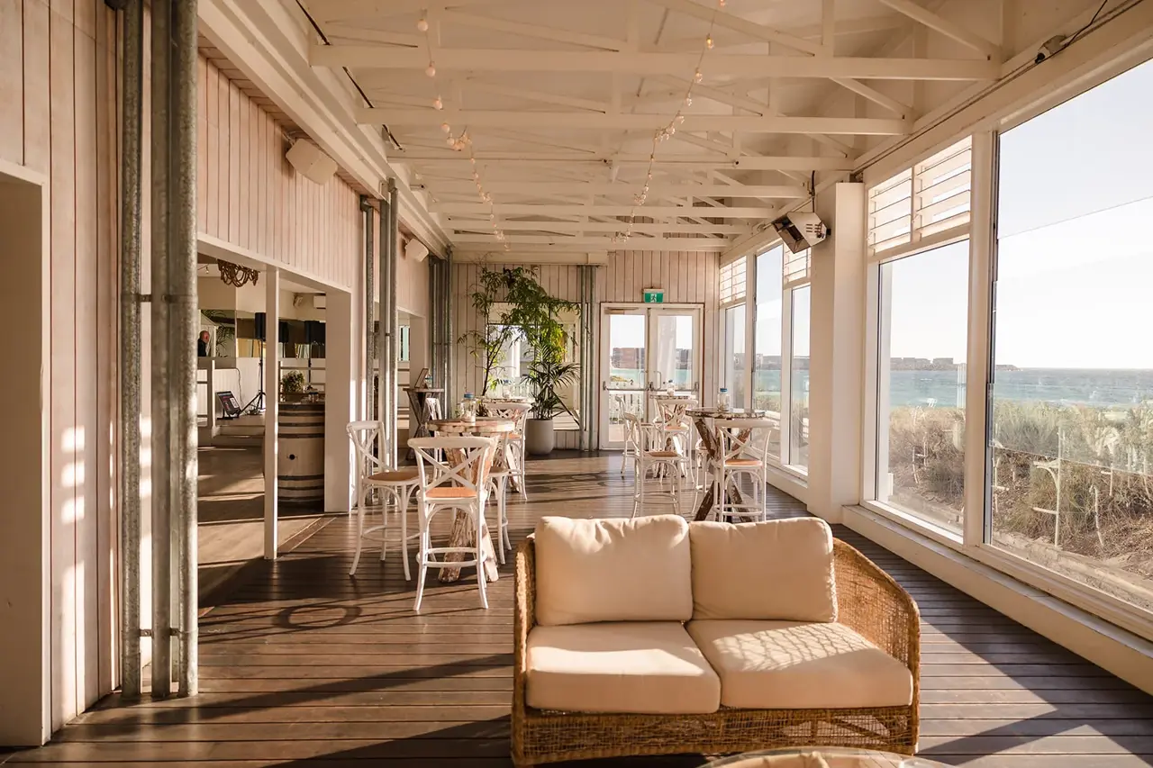 Floor-to-ceiling ocean-view windows at COAST Port Beach