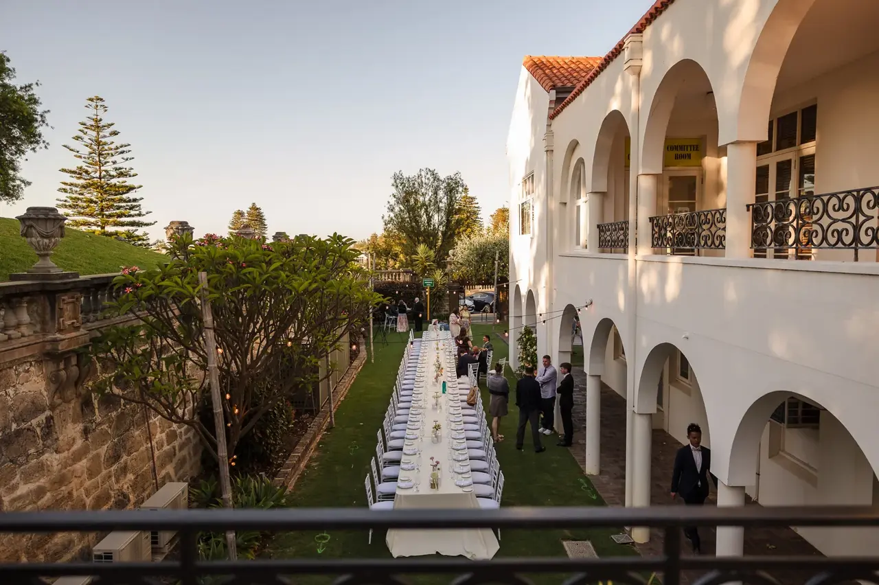 The loggia and terraced lawn looking toward the ocean at Cottesloe Civic Centre