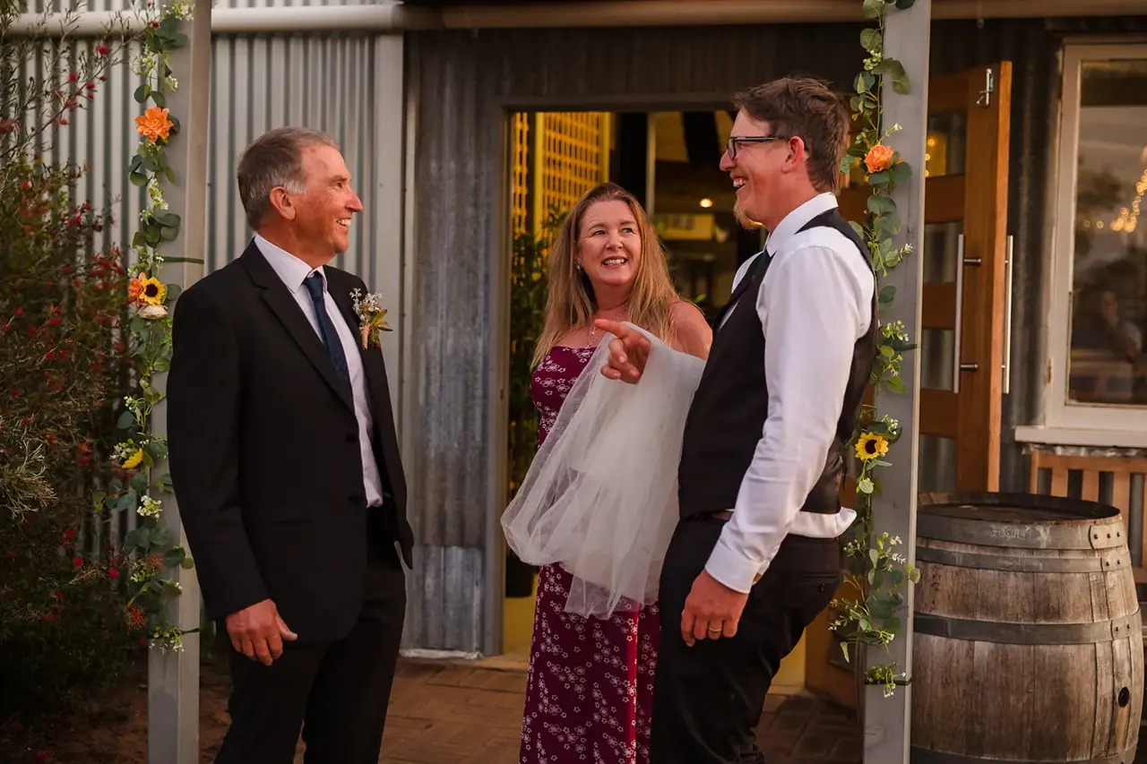 Guests at the flower-framed entrance of the reception room at Walkers Hill Vineyard