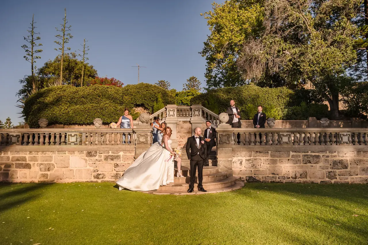 Couple in the pine-lined grounds at Cottesloe Civic Centre