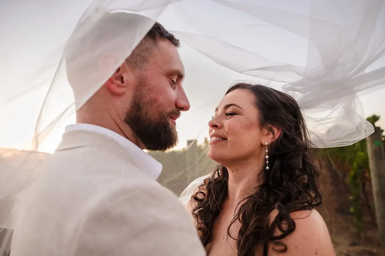 Veil catching the golden hour light at a Sittella Winery wedding