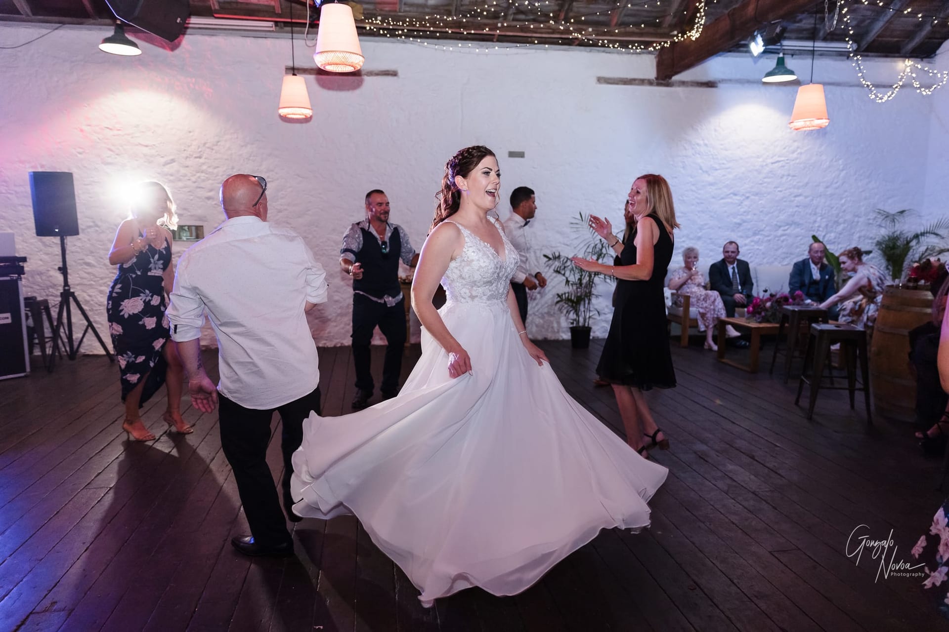 Bride dancing during the wedding reception inside of Kidogo Arthouse in Fremantle