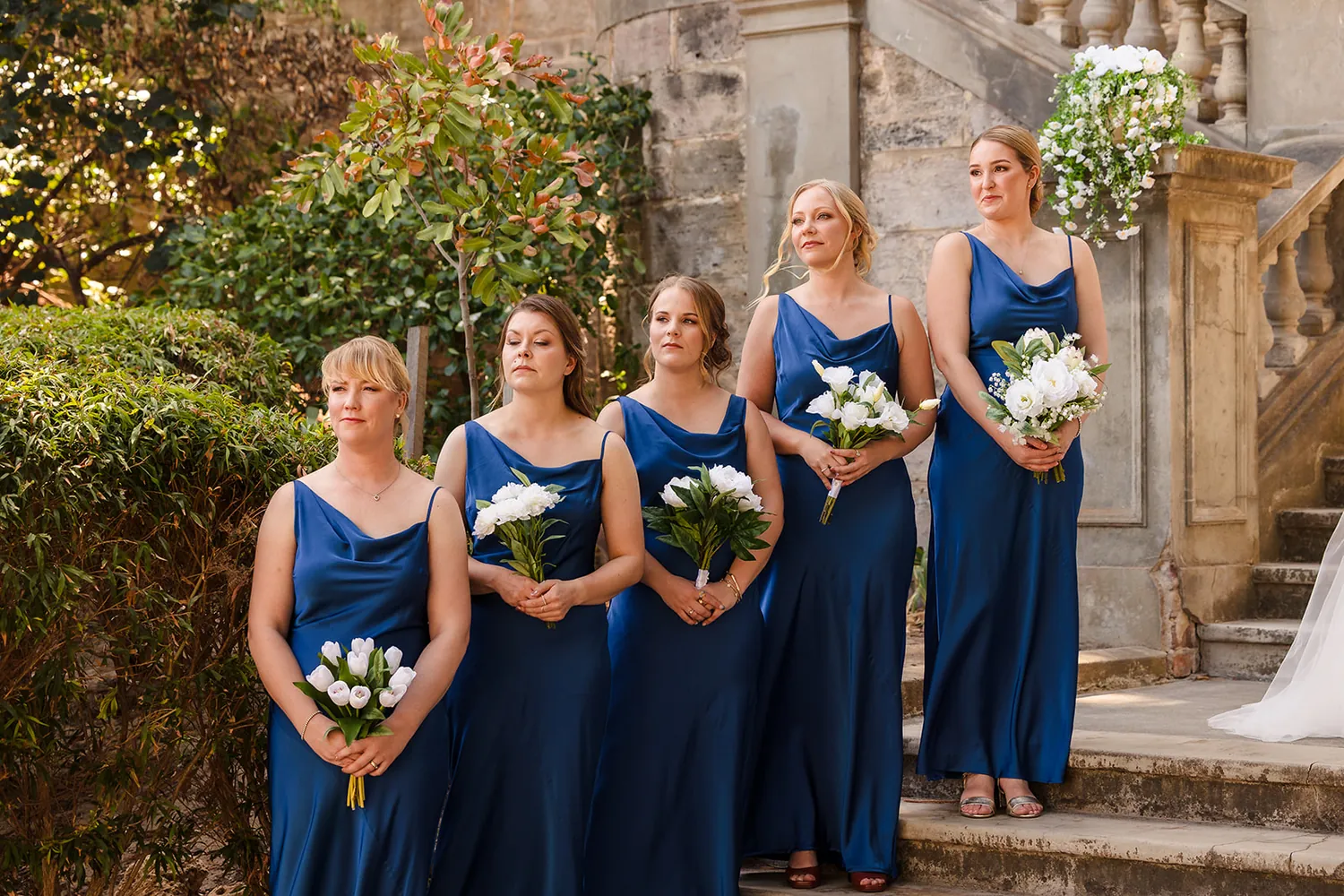 The whole bridal party on the grand limestone staircase at Cottesloe Civic Centre