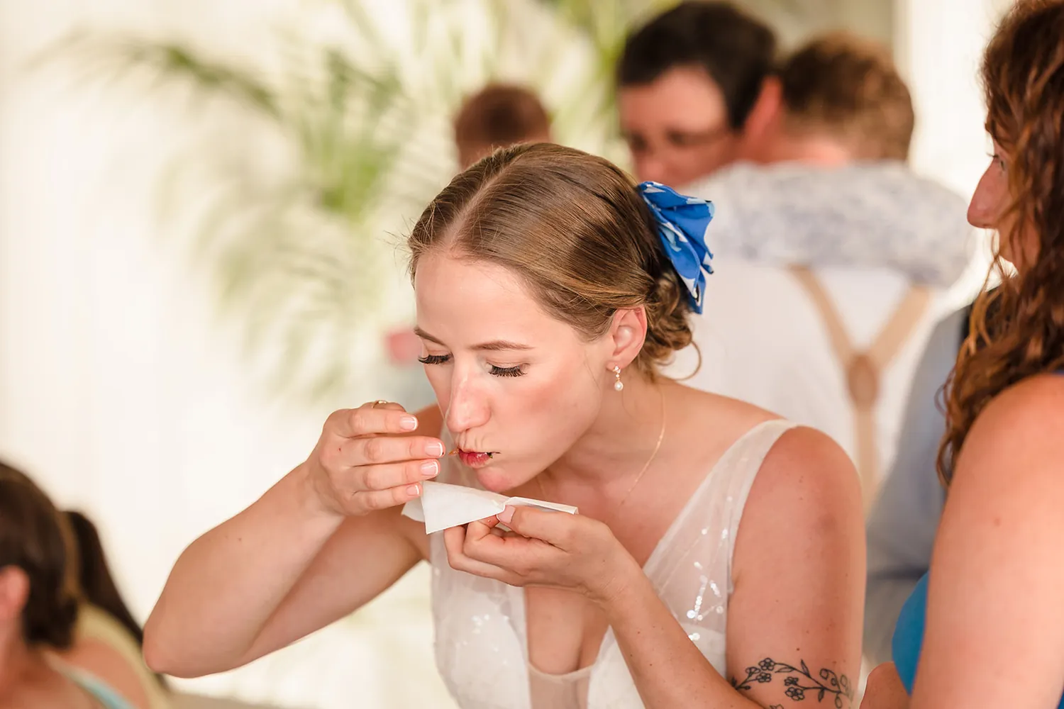 The bride enjoying a canape at the reception