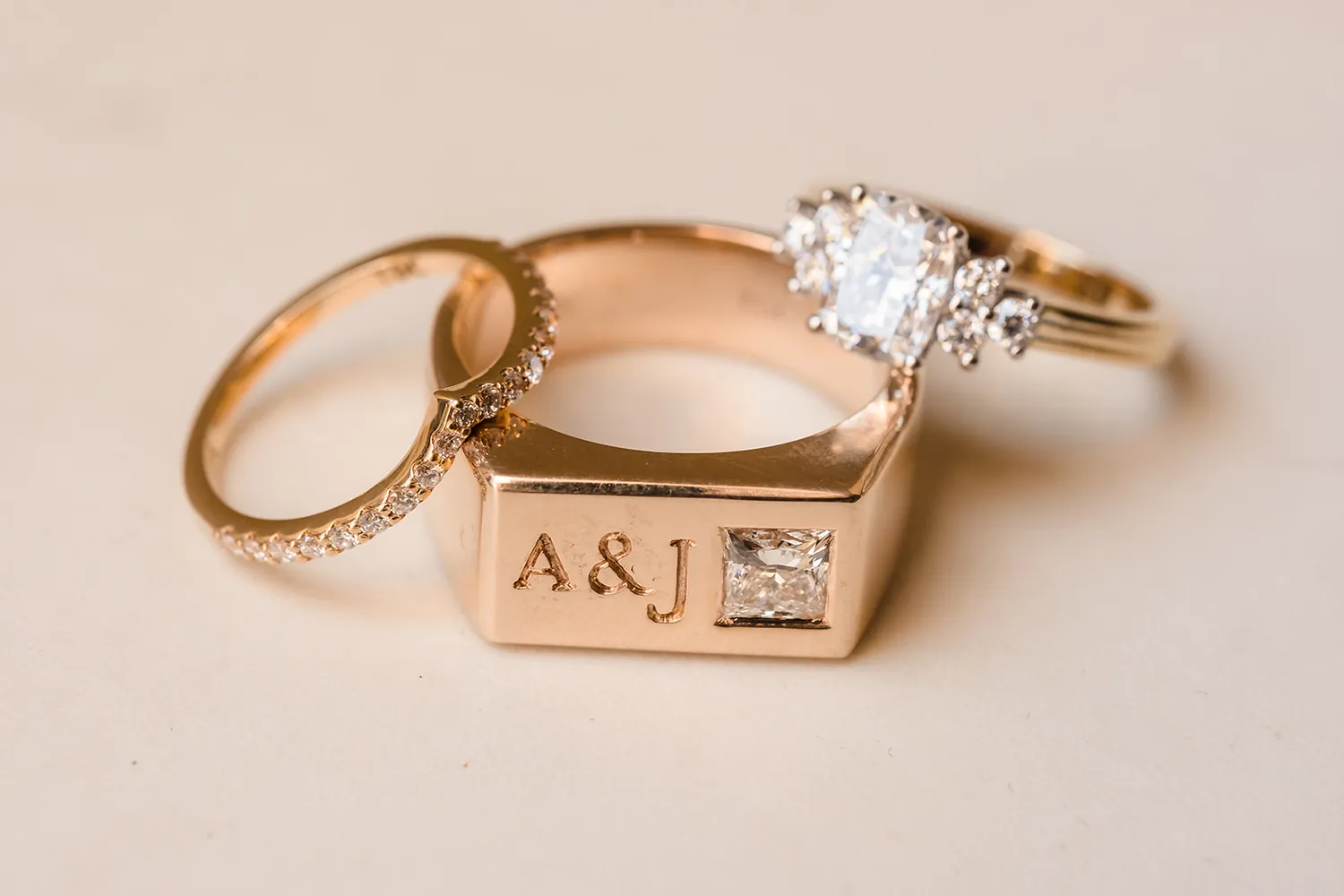 Custom signet wedding rings engraved A and J