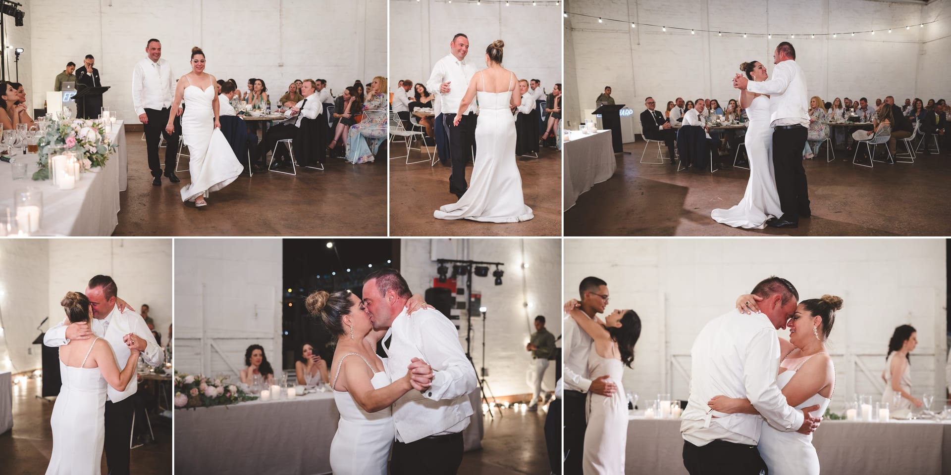 Bride and groom dancing joyfully at a wedding reception; guests seated at tables, candles on tables; white decor, string lights above.