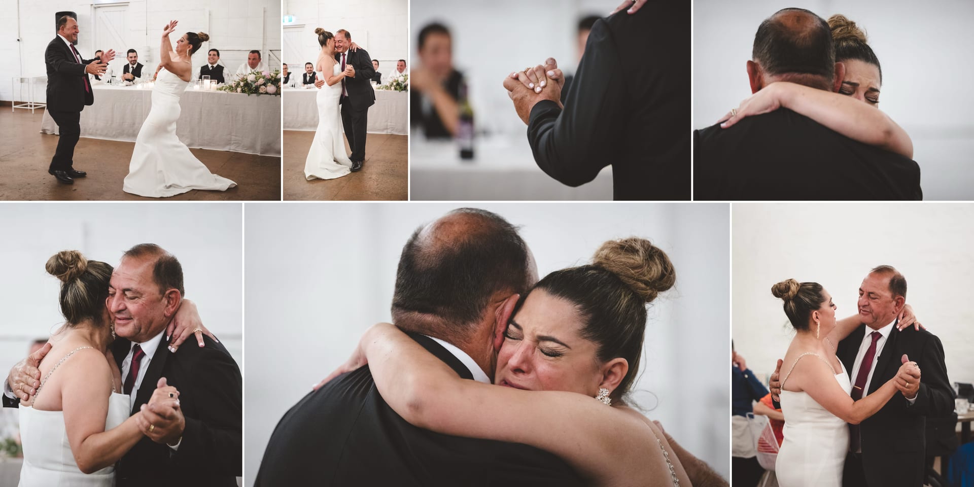 Bride and man dance emotionally at a wedding, with onlookers seated in the background. The setting is a brightly lit venue.