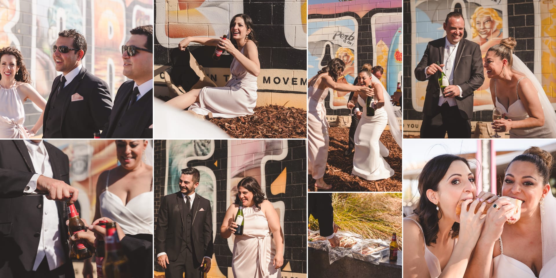 Smiling brides and guests in dresses and suits enjoy drinks and snacks against colorful graffiti walls, creating a lively, festive mood.