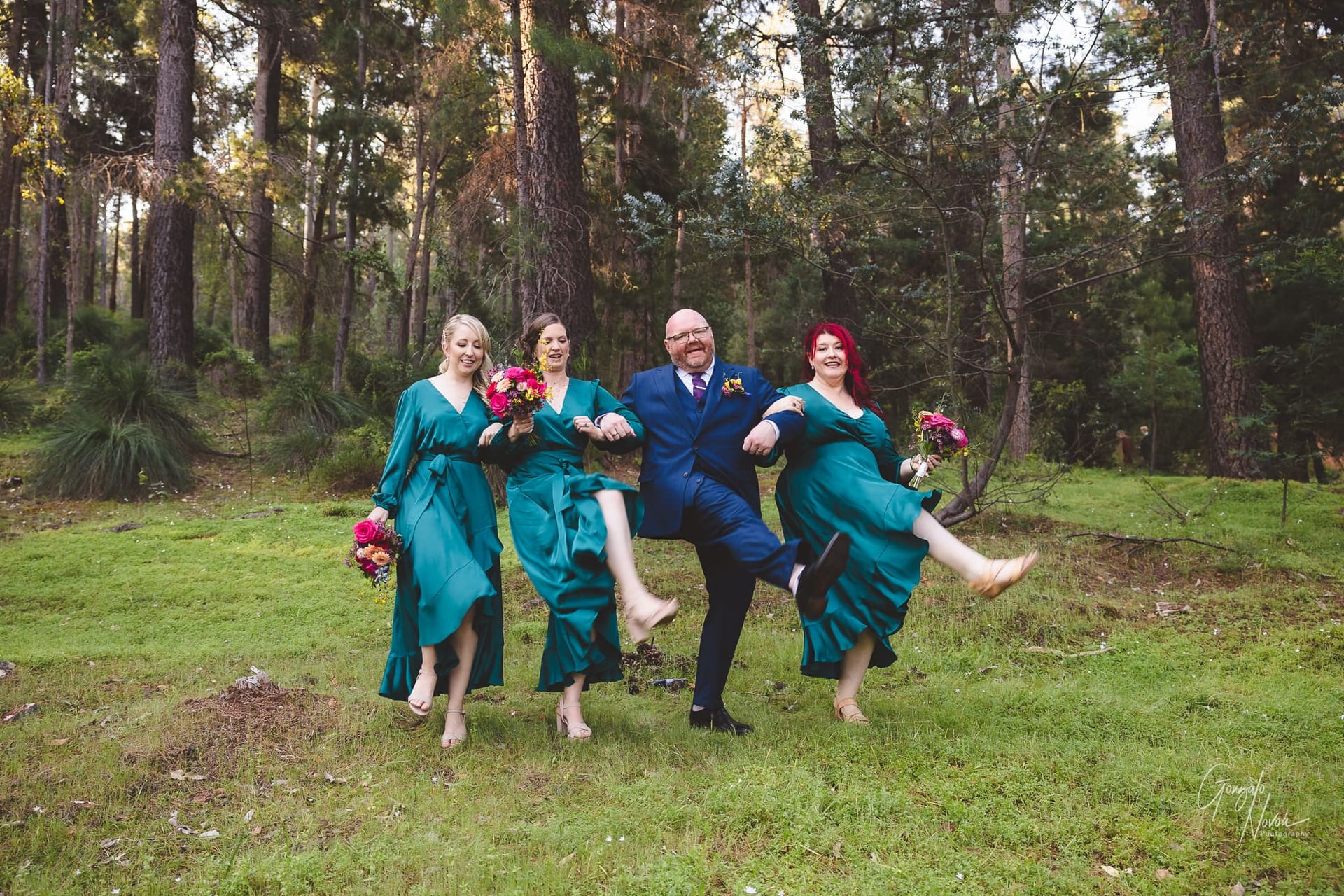 Bridal party fun! the bridesmaids and the groom dancing!