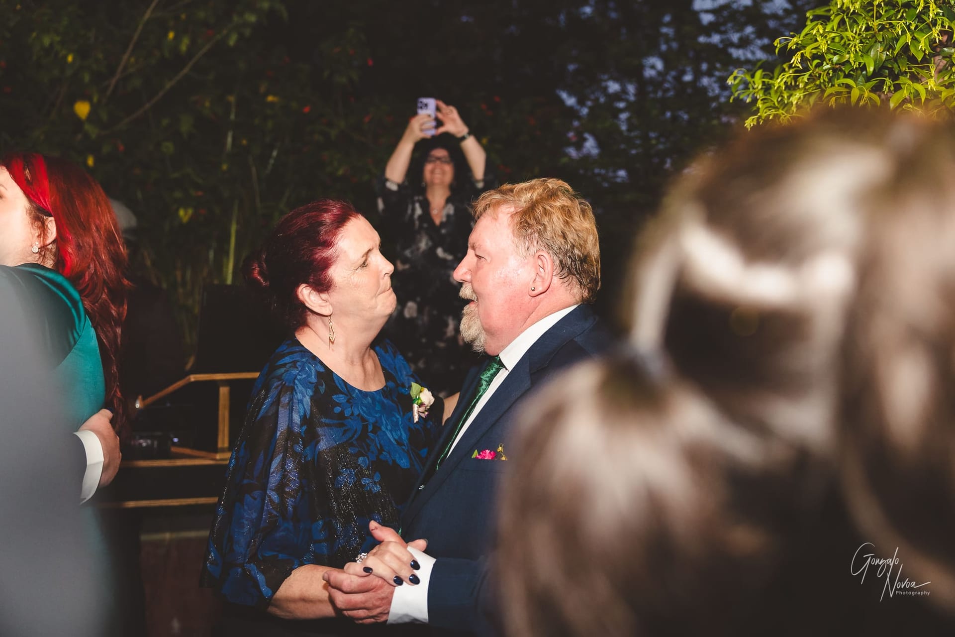 Parents of the groom dancing during the reception