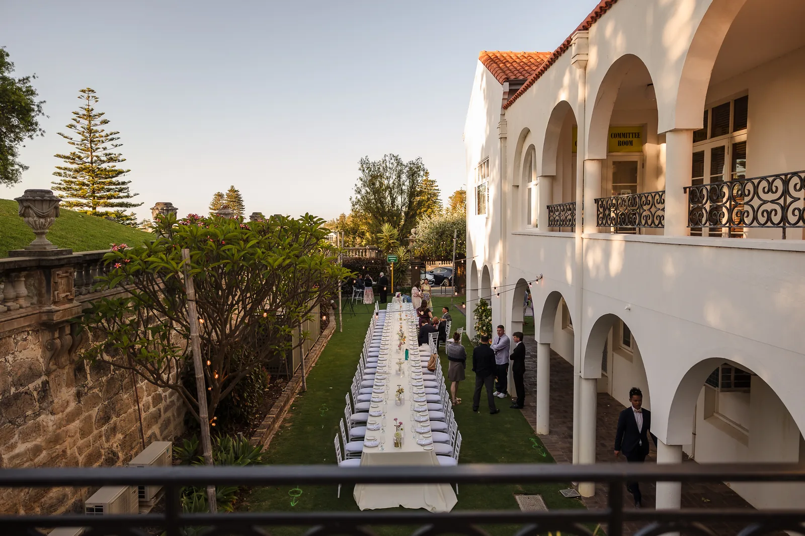 The loggia and terraced lawn looking toward the ocean at Cottesloe Civic Centre